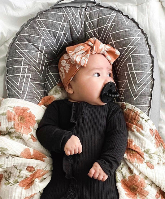How to Create a Safe & Stylish Newborn Space With a Baby Nest